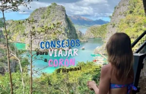 Mireia de espaldas contemplando el mirador de las lagunas de Corón en Filipinas con montañas de fondo.