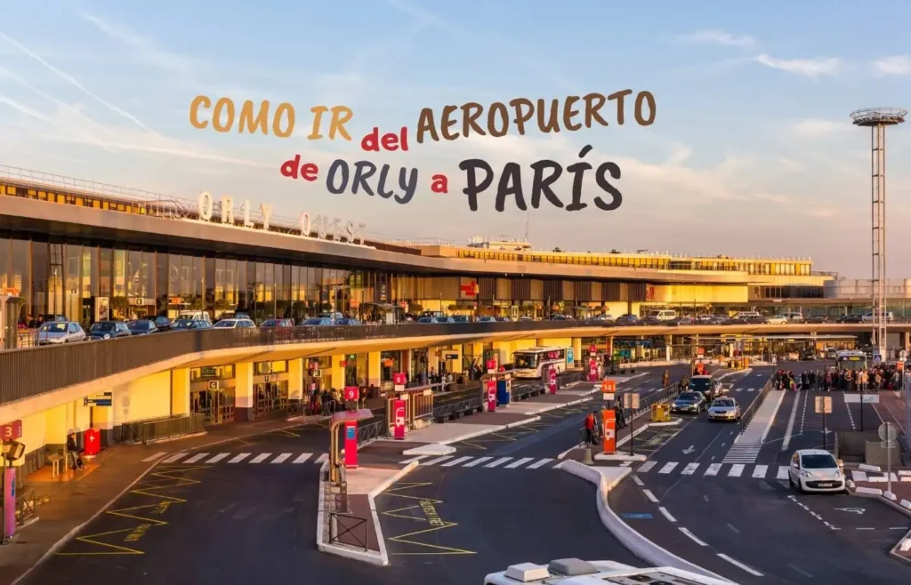 Terminal del aeropuerto de Orly con señalización de transporte hacia el centro.